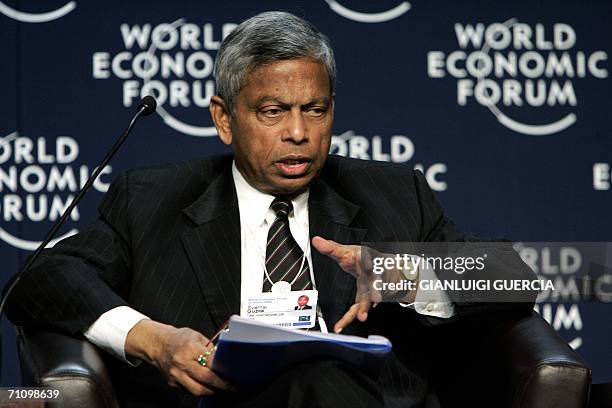 Cape Town, SOUTH AFRICA: The chairman of Tata international India, Syamal Gupta, speaks 01 June 2006 at the plenary session during the second day of...