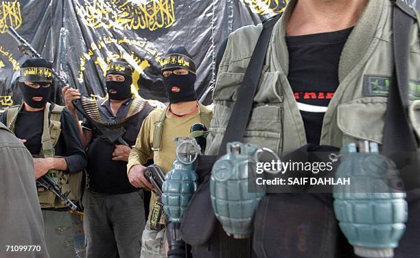 Armed Islamic Jihad militants attends a rally in support a proposal put forward to help end the crises the Palestinian Territories in the Jenin...