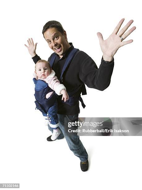 high angle view of a mature man carrying his daughter - house husband stock pictures, royalty-free photos & images