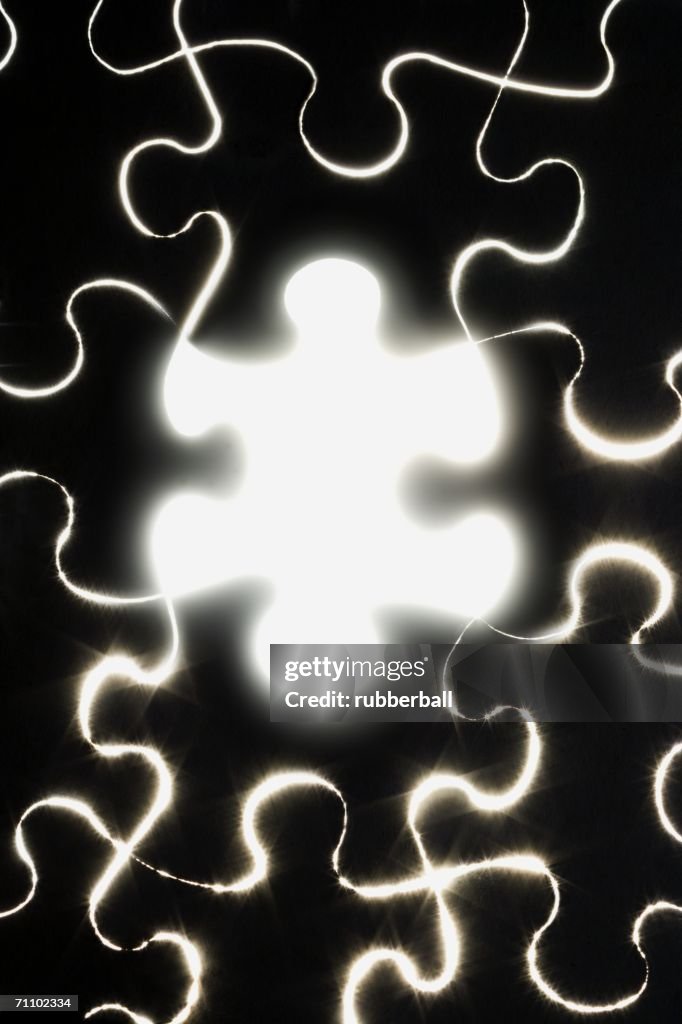 Close-up of the missing piece of a jigsaw puzzle