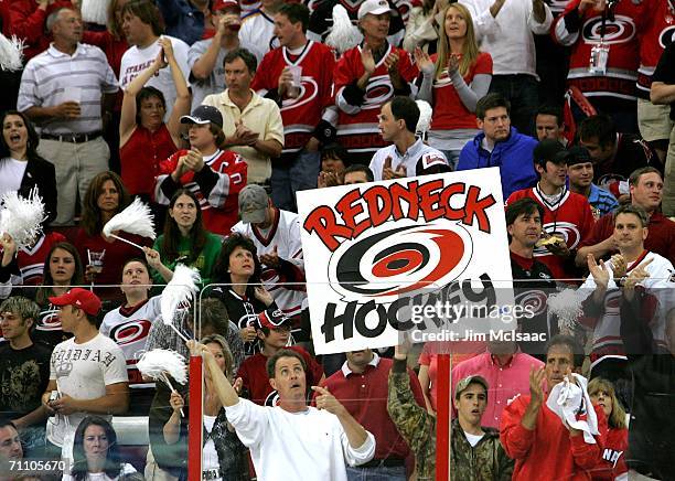 Carolina Hurricanes fans hold up a sign in the first period of game seven against the Buffalo Sabres during the Eastern Conference Finals in the 2006...