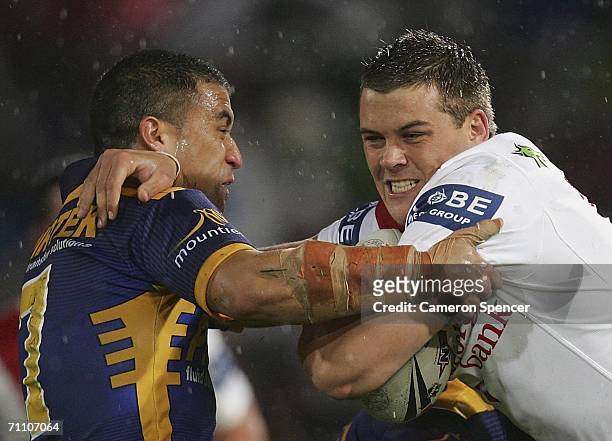 Danny Wicks of the Dragons is tackled during the round 13 NRL match between the St George Illawarra Dragons and the Parramatta Eels at OKI Jubilee...