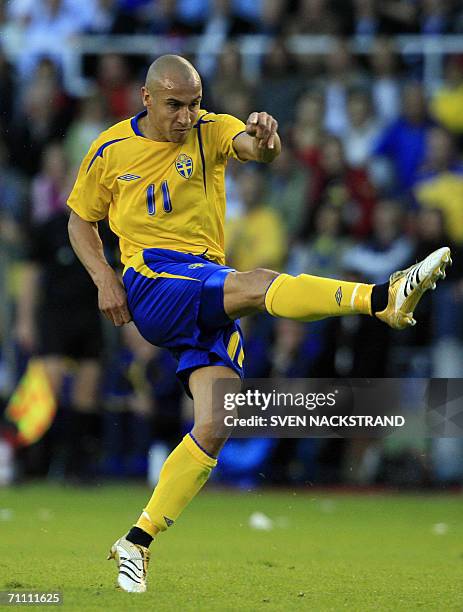 Sweden's Henrik Larsson shoots as Sweden plays a draw against Chile, 1-1, in Solna, Stockholm, 02 June 2006, in a friendly match in preparation for...