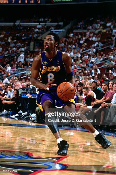 Kobe Bryant of the Los Angeles Lakers drives to the basket against the Philadelphia 76ers during game four of the 2001 NBA Finals played June 13,...