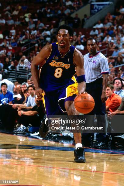 Kobe Bryant of the Los Angeles Lakers drives towards the basket against the Philadelphia 76ers during game four of the 2001 NBA Finals played June...