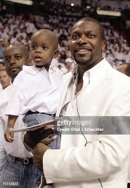 Actor Chris Tucker and his son, Destin Christopher, attend game six of the Eastern Conference Finals between the Detroit Pistons and the Miami Heat...