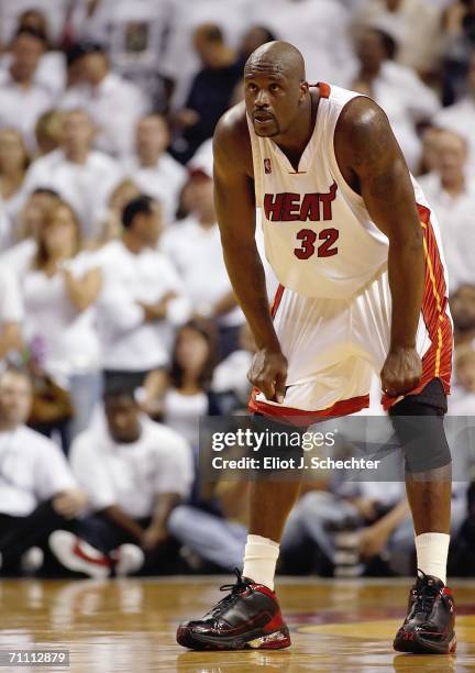 Shaquille O'Neal of the Miami Heat leans over in game six of the Eastern Conference Finals against the Detroit Pistons during the 2006 NBA Playoffs...