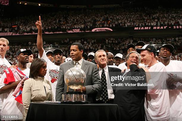 The Miami Heat celebrate after defeating the Detroit Pistons in game six of the Eastern Conference Finals during the 2006 NBA Playoffs at American...