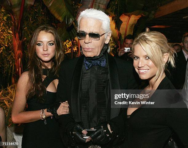 Actress Lindsay Lohan, designer Karl Lagerfeld and singer Jessica Simpson pose at the International Launch of Dom Perignon Rose Vintage 1996...