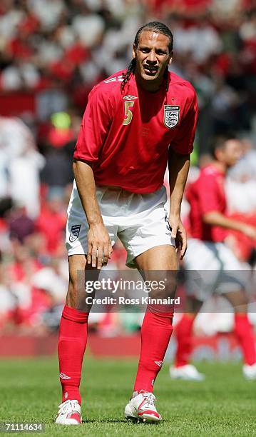 Rio Ferdinand of England struggles after taking a knock during the International Friendly between England and Jamaica at Old Trafford on June 3, 2006...
