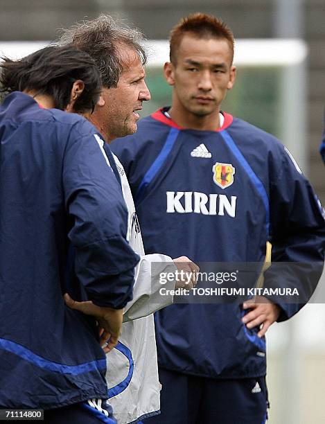 Brazilian head coach Zico of Japan's national football team speaks to Hidetoshi Nakata and other players during their trainning session at the Sport...