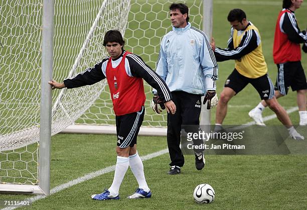 Lionel Messi stretches during a Argentina team training session on June 3, 2006 in Herzogenaurach, Germany. The Argentina squad are preparing for the...