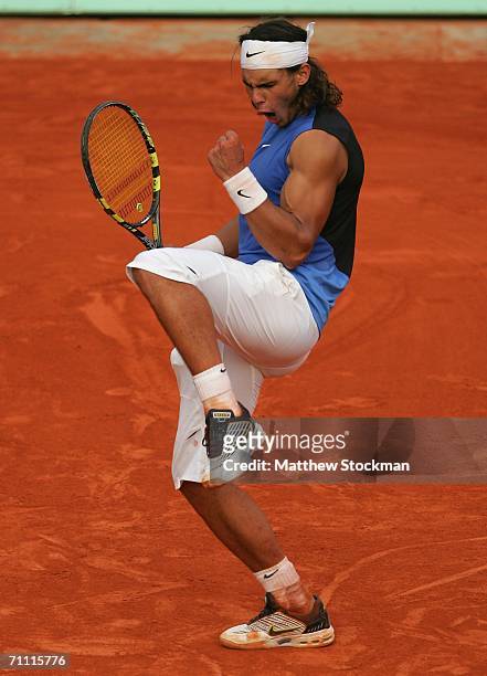 Rafael Nadal of Spain celebrates against Paul-Henri Mathieu of France during day seven of the French Open at Roland Garros on June 3, 2006 in Paris,...