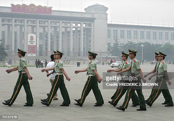 Paramilitary police march on Tiananmen Square, 04 June 2006, amid heightened security on the 17th anniversary of the 1989 Tiananmen Square massacre...