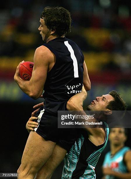 Andrew Walker of the Blues marks during the round 10 AFL match between the Carlton Blues and the Port Adelaide Power at the Telstra Dome June 4, 2006...