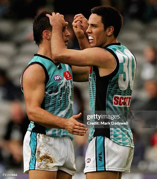 Warren Tredrea of the Power celebrates a goal with Troy Chaplin during the round 10 AFL match between the Carlton Blues and the Port Adelaide Power...
