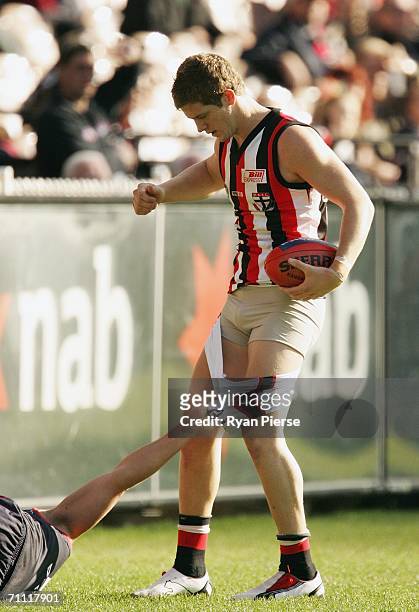 Nick Dal Santo of the Saints has his shorts pulled down during the round ten AFL match between the Melbourne Demons and the St Kilda Saints at the...