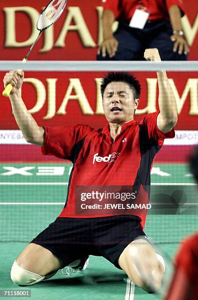 Chinese shuttler Zhonogbo Xie celebrates after he and his partner Yawen Zhangy defeated Indonesian Nova Widianto and Liiyana Natsir at the end of the...