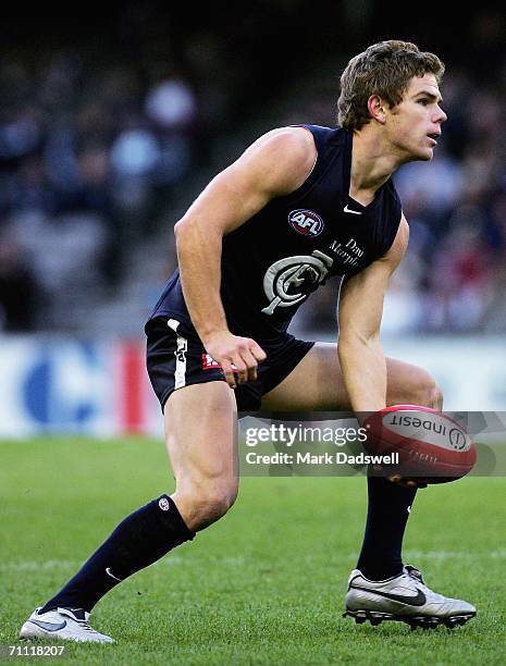 Adam Bentick of the Blues looks for a teammate during the round 10 AFL match between the Carlton Blues and the Port Adelaide Power at the Telstra...