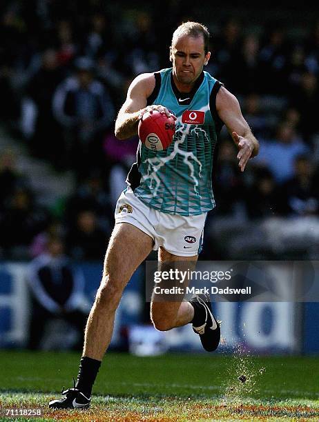 Matthew Bishop of the Power looks for a teammate during the round 10 AFL match between the Carlton Blues and the Port Adelaide Power at the Telstra...