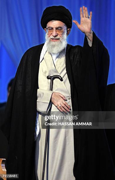 Iran's supreme leader Ayatollah Ali Khamenei salutes as he arrives to deliver a speech marking the 17th anniversary of the death of Iran's Islamic...