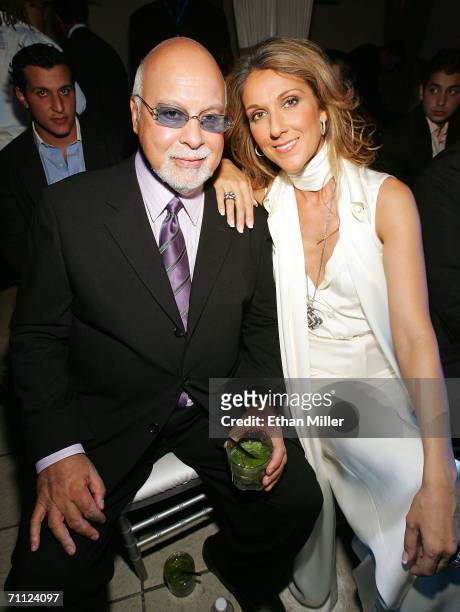 Singer Celine Dion and her husband and manager Rene Angelil pose before a fashion show by jewellery designer Chris Aire at the Pure Nightclub at...