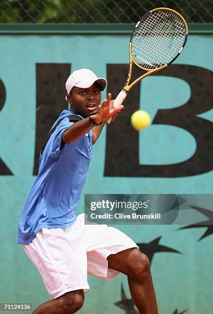 Donald Young of the United States in action against Ricardo Urzua-Rivera of Chile during a boys junior match on day nine of the French Open at Roland...