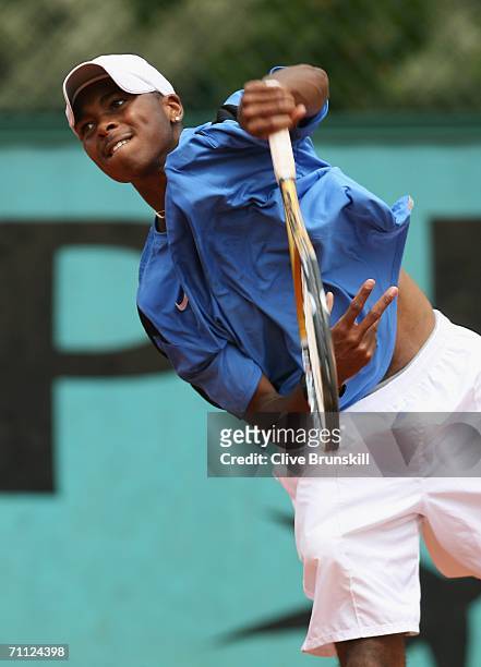 Donald Young of the United States in action against Ricardo Urzua-Rivera of Chile during a boys junior match on day nine of the French Open at Roland...