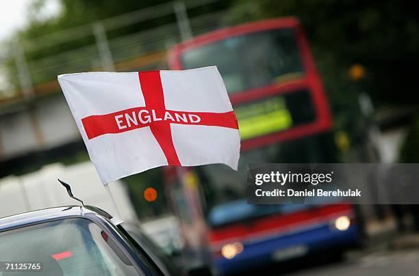 An England flag to support the English team for the upcoming soccer World Cup in Germany is pictured on a car on June 5, 2006 in London, England. The...