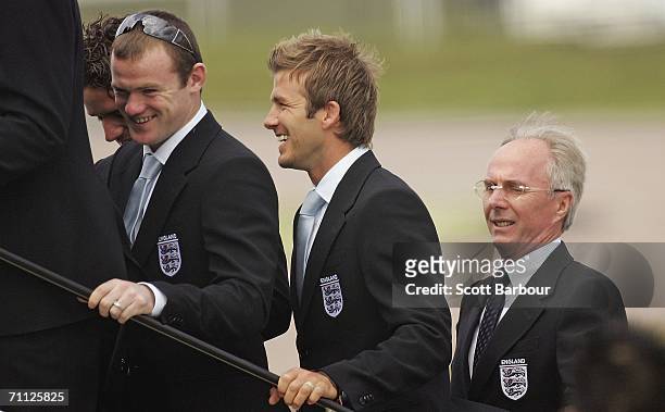 England captain David Beckham , coach Sven-Goran Eriksson and Wayne Rooney board their plane at Luton Airport as the England World Cup football squad...