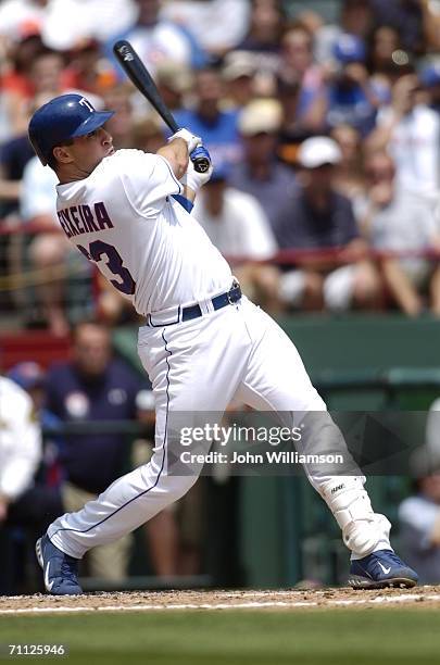 Mark Teixeira of the Texas Rangers bats during the game against the Tampa Bay Devil Rays at Ameriquest Field in Arlington in Arlington, Texas on...