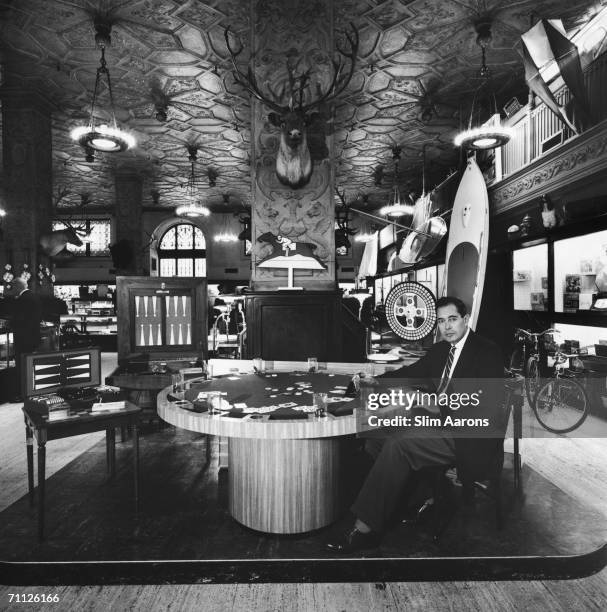 Sports writer John Lardner in the Abercrombie and Fitch store in New York, December 1959.