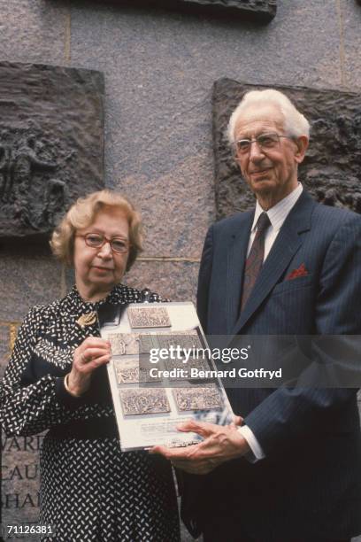 Austrian citizen Miep Gies and her husband, Dutch citizen Jan Gies hold a plaque at an award ceremony where they were honored with the...