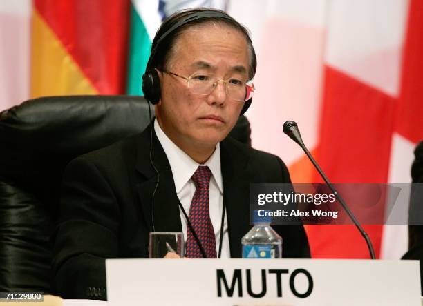 Bank of Japan Deputy Governor Toshiro Muto listens to a question during a central bankers panel discussion at the 2006 International Monetary...