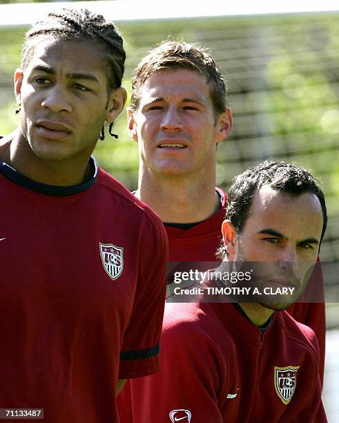 United States midfielder Landon Donovan is flanked by teammates Oguchi Onyewu and Brian McBride during a training session at The Edmund Plambeck...