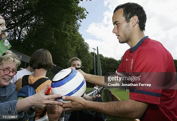 Landon Donovan signs autographs during a training session for the United States National Team on June 6, 2006 at Edmund Plambeck Stadium in...