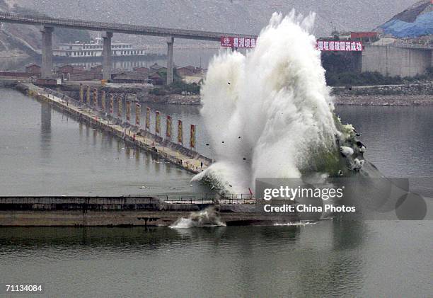 The cofferdam protecting main wall of the Three Gorges Dam is exploded underwater June 6, 2006 in Yichang, Hubei Province, central China. The...