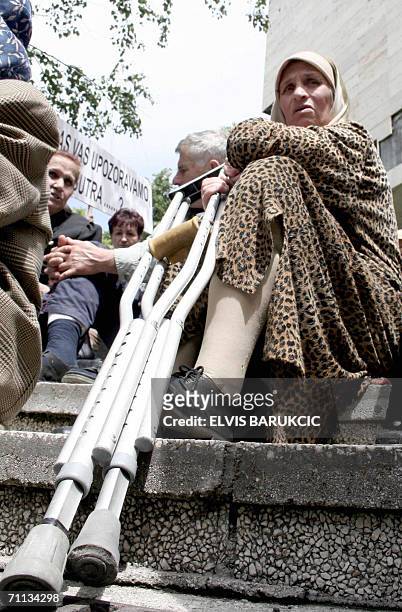 Sarajevo, BOSNIA AND HERCEGOVINA: Sejda Guta protests among a group of approximately 200 civilian victims of the Bosnian war, in front of the Bosnian...