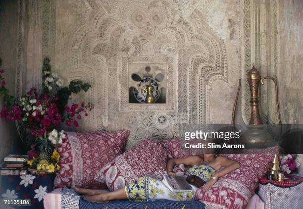 Carol Anderson, who works in catering at the Peponi Hotel, visits the 18th century Kisimani House on Lamu Island, in the Lamu Archipelago of Kenya,...
