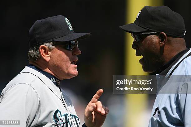 Mike Hargrove of the Seattle Mariners speaks with umpire Chuck Meriwether during the game against the Chicago White Sox at U.S. Cellular Field in...