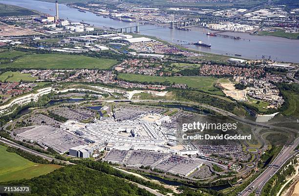 Europe's Largest Shopping Centre, Bluewater, with the Queen Elizabeth II bridge in the background, sits beside the River Thames in this aerial photo,...