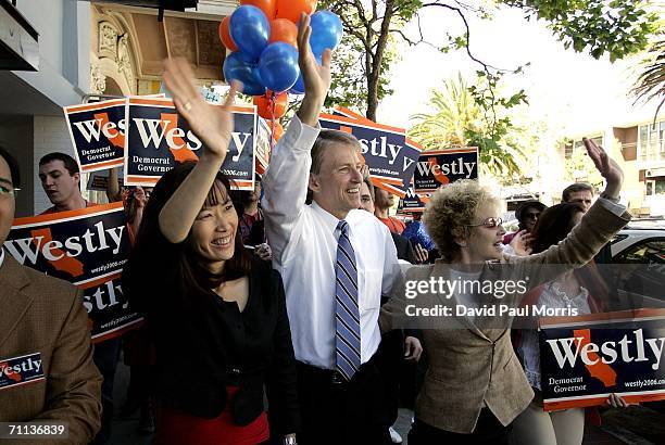 Democratic gubernatorial candidate Steve Westly with wife Anita and State Senator Carole Migden greets voters in the Castro district June 6, 2006 in...