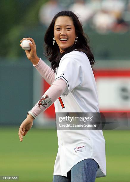 Golfer Michelle Wie throws out the first pitch prior to the game between the Toronto Blue Jays and the Baltimore Orioles on June 6, 2006 at Camden...