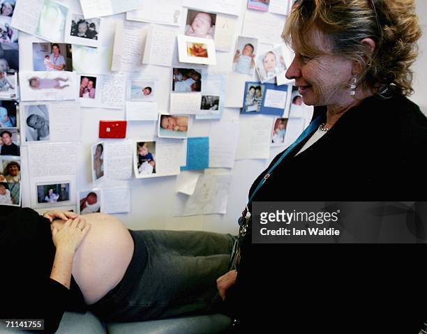 Midwife chats with a pregnant woman during a routine check-up at Royal North Shore Hospital's Birth Centre June 7, 2006 in Sydney, Australia....