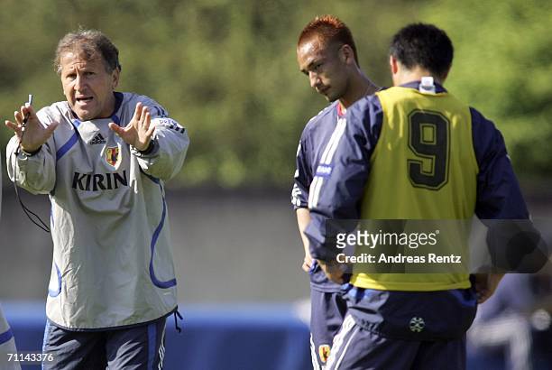 Coach Zico gestures as Hidetoshi Nakata looks on during the training session of Japan National Football Team on June 7, 2006 in Bonn, Germany. Japan...