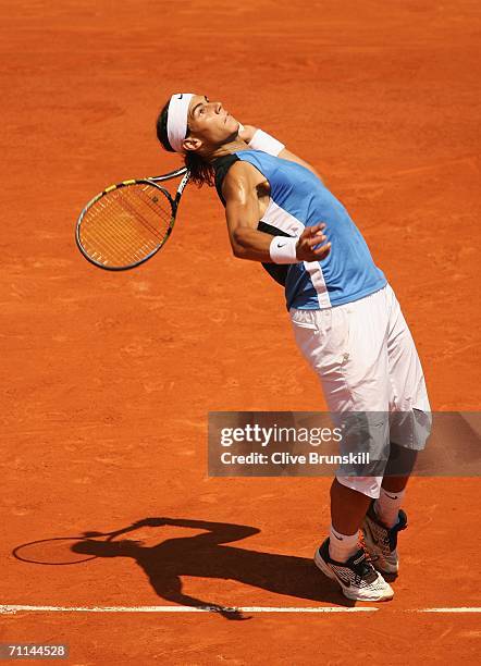 Rafael Nadal of Spain serves against Novak Djokovic of Serbia and Montenegro during day eleven of the French Open at Roland Garros on June 7, 2006 in...