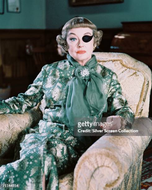Bette Davis wearing an eyepatch in her role as Mrs Taggart in Roy Ward Baker's comedy 'The Anniversary', 1968.