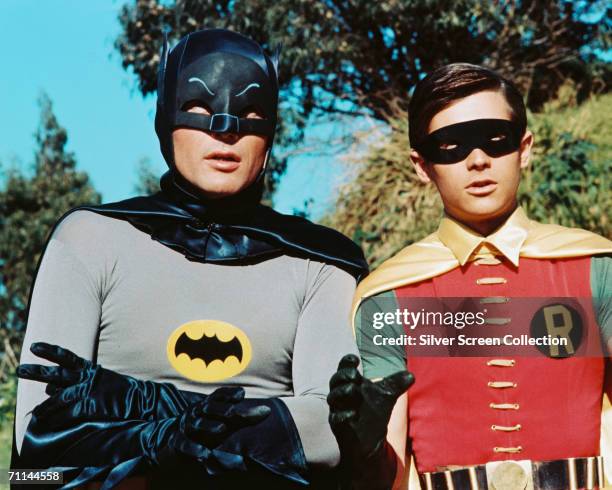 American actors Adam West as Bruce Wayne/Batman and Burt Ward as Dick Grayson/Robin in the TV series 'Batman', circa 1966.