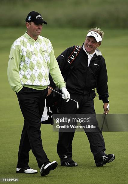 Thomas Bjorn of Denmark walks with his new caddy, Dominic Bott during the Pro-Am of the 2006 BC-CA Golf Open, presented by Telekom Austria at Fontana...