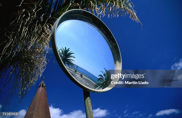 traffic mirror reflecting ocean, giardini-naxos, italy - ジャルディニナクソス ストックフォトと画像